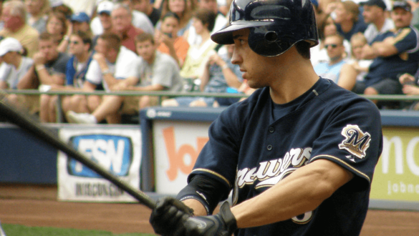 Ryan Braun takes a cut in the on deck circle.