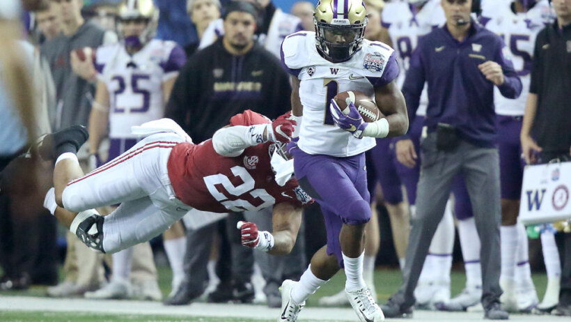 John Ross races down the sideline