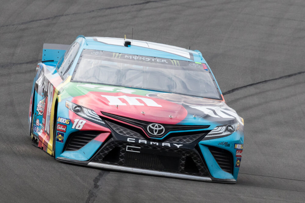 Kyle Busch races into turn 1 during the Pocono 400 at Pocono Raceway in Long Pond, PA