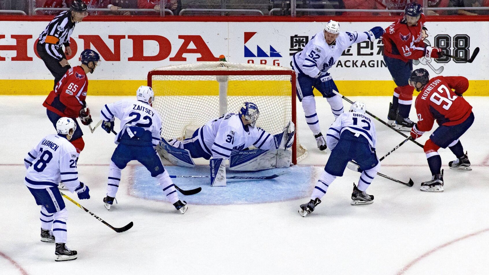 Frederik Andersen stops the puck.