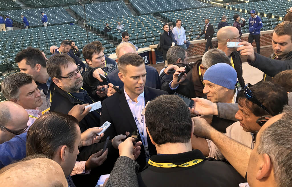Theo Epstein talks to reporters at Wrigley Field.