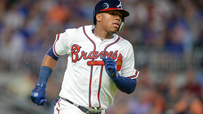 Braves rookie Ronald Acuna, Jr. circles the bases after hitting a go-ahead home run.