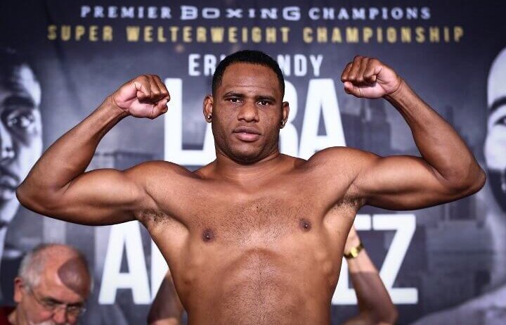 Frank Sanchez Faure flexing at a weigh in