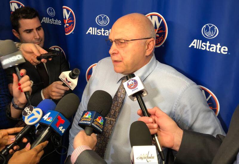 Islanders coach Barry Trotz answering questions from the media.