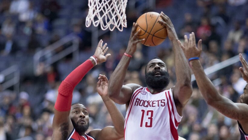 James Harden lays the ball up.