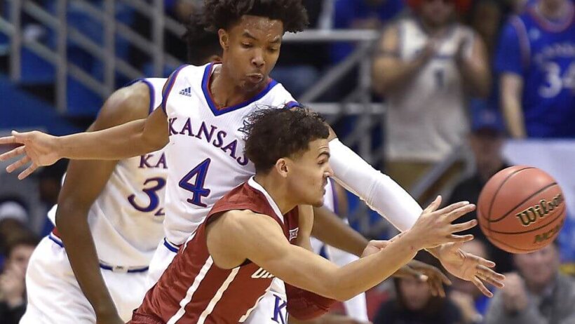 Kansas guard Devonte Graham guards Oklahoma's Trae Young