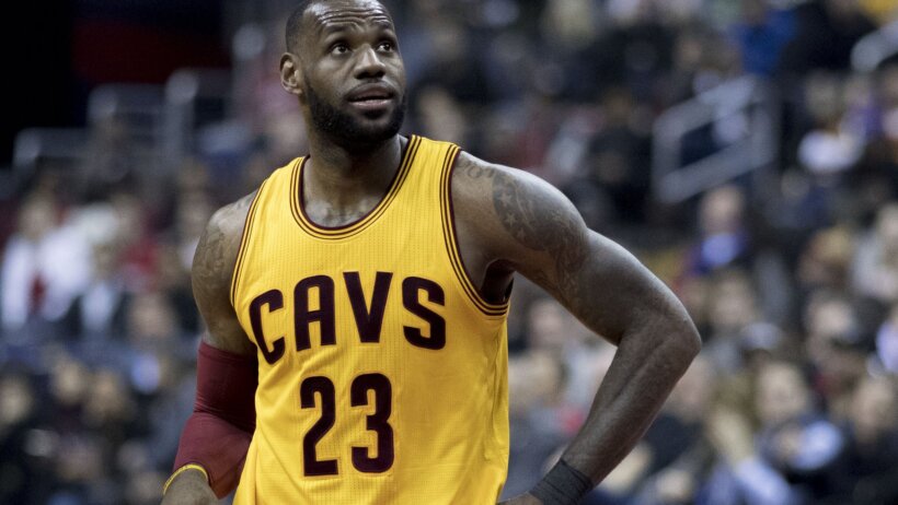 LeBron James looking up at the scoreboard
