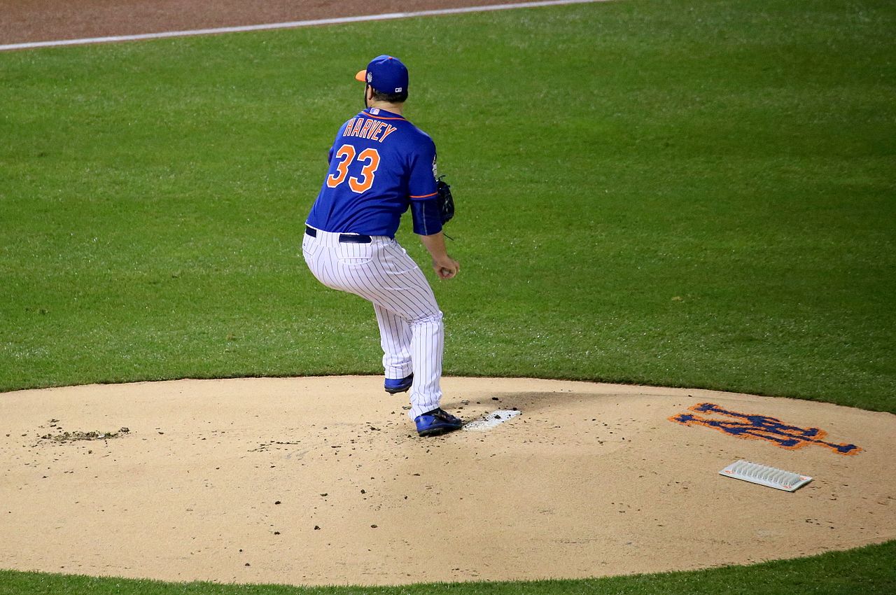 NY Mets starter Matt Harvey delivers a pitch