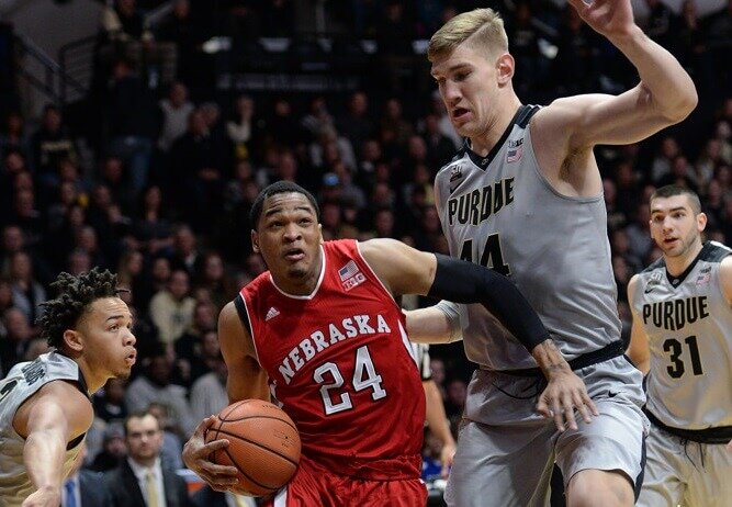 Purdue center Isaac Haas defending Nebraska's James Palmer Jr.