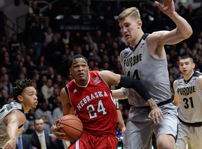 Purdue center Isaac Haas defending Nebraska's James Palmer Jr.