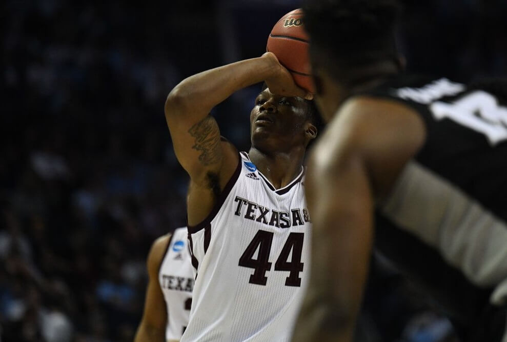 Texas A&M forward Robert Williams shoots a free throw.
