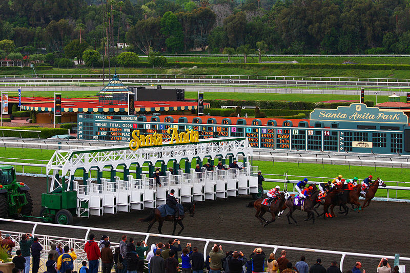 Horses leave the gate at Santa Anita Racetrack.