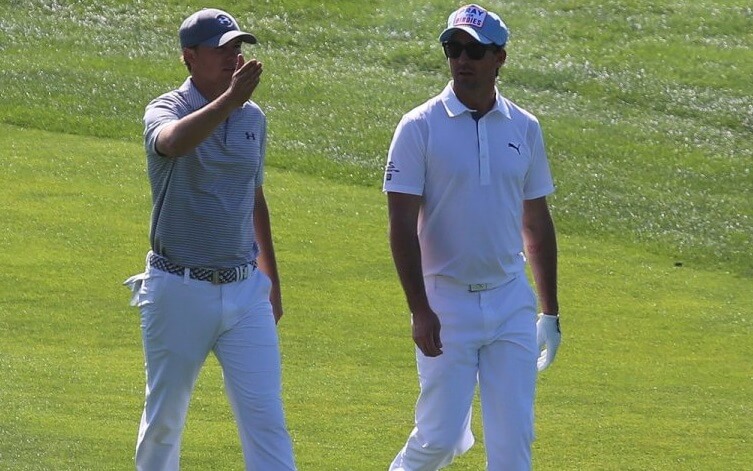 Jordan Spieth walking down a fairway
