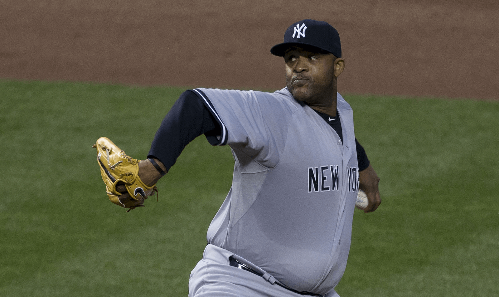 Yankee pitcher CC Sabathia delivering a pitch