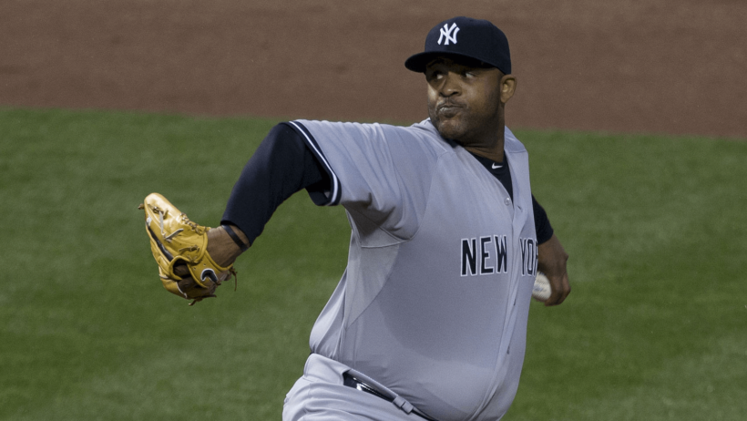 Yankee pitcher CC Sabathia delivering a pitch