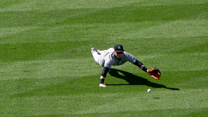 Clint Frazier diving for a ball.