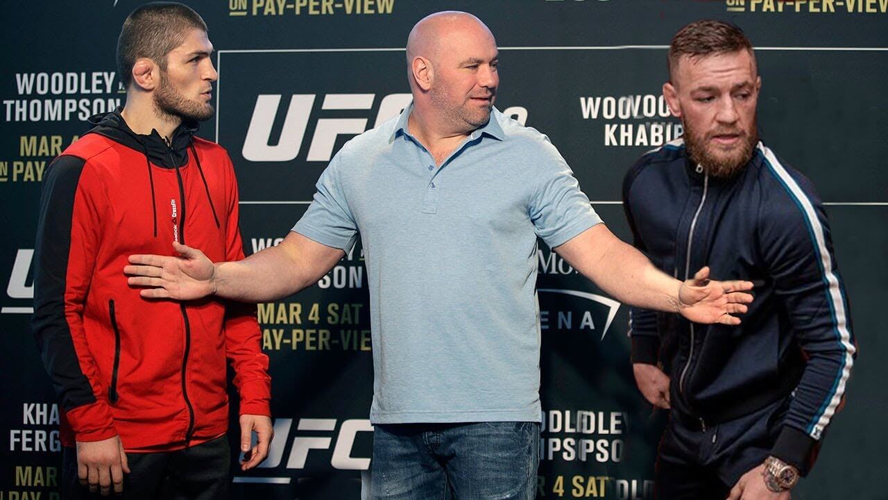 Dana White stands between Conor and Khabib at the staredown.