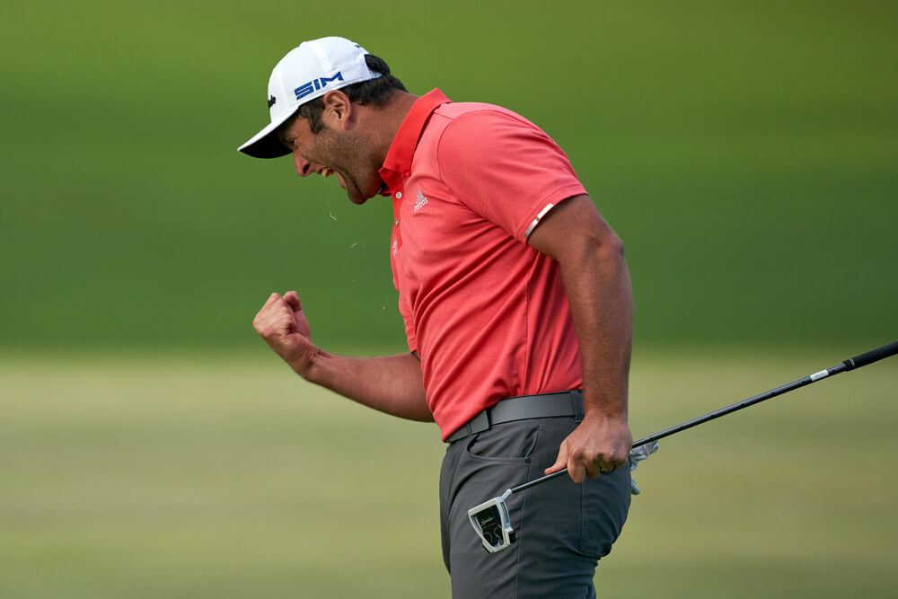 Jon Rahm celebrates