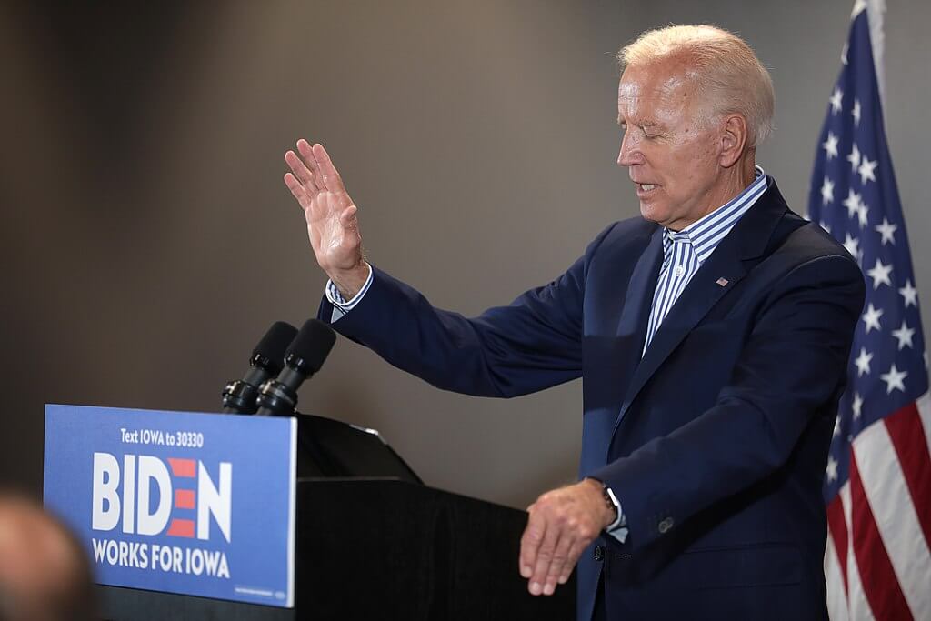 Joe Biden speaking at a podium