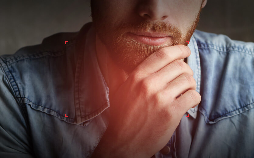 image of a man who appears to be thinking