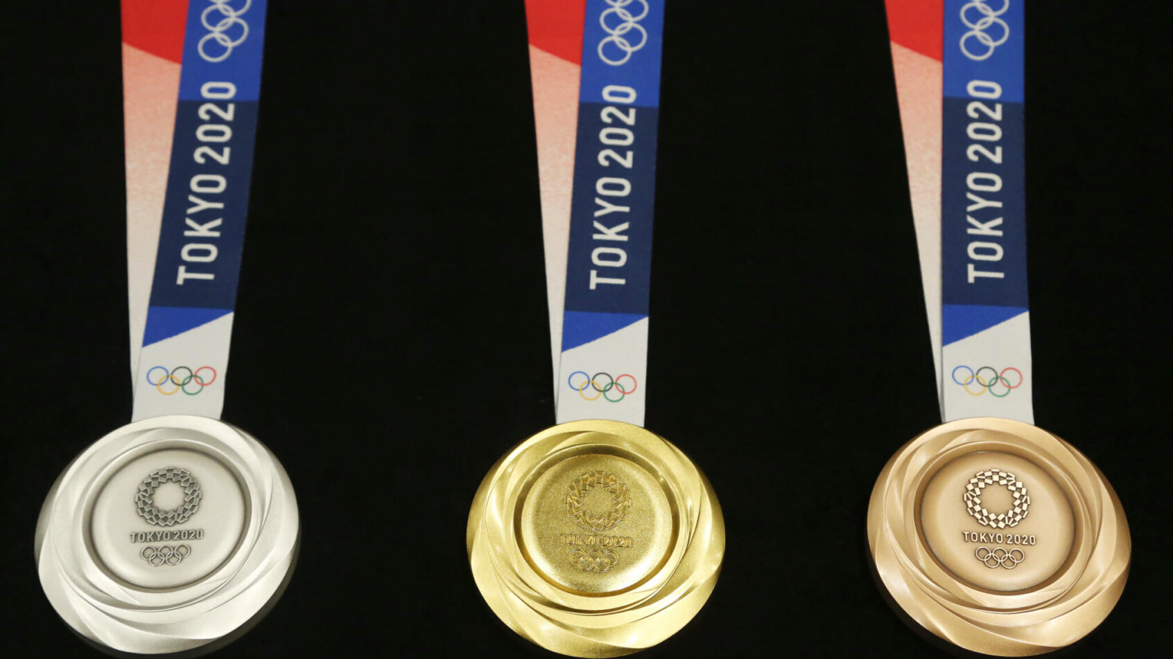 Examples of the medals handed out at the Tokyo Olympics