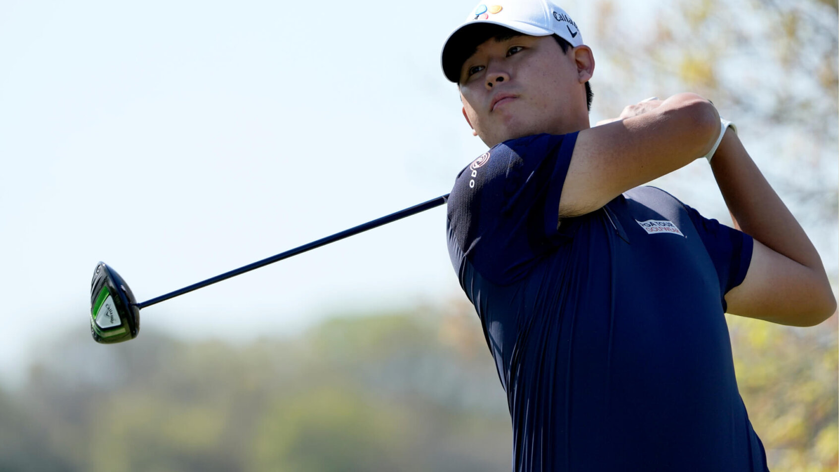 Si Woo Kim poses after tee shot