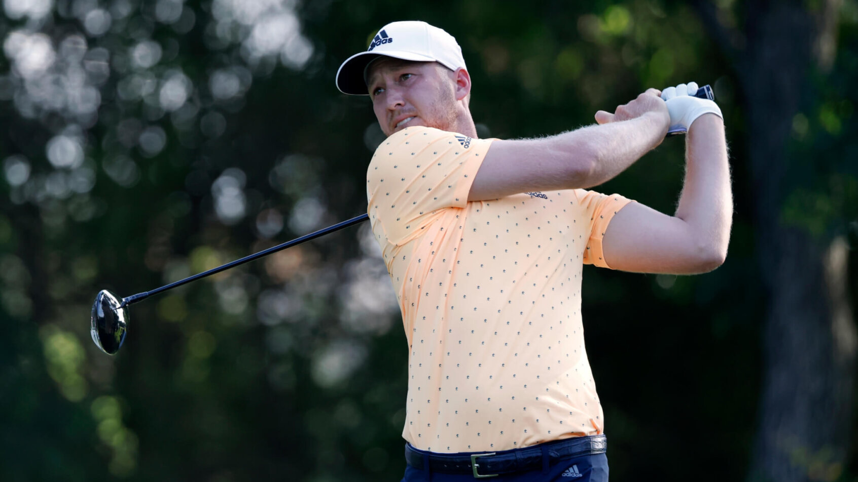 Daniel Berger admires a tee shot