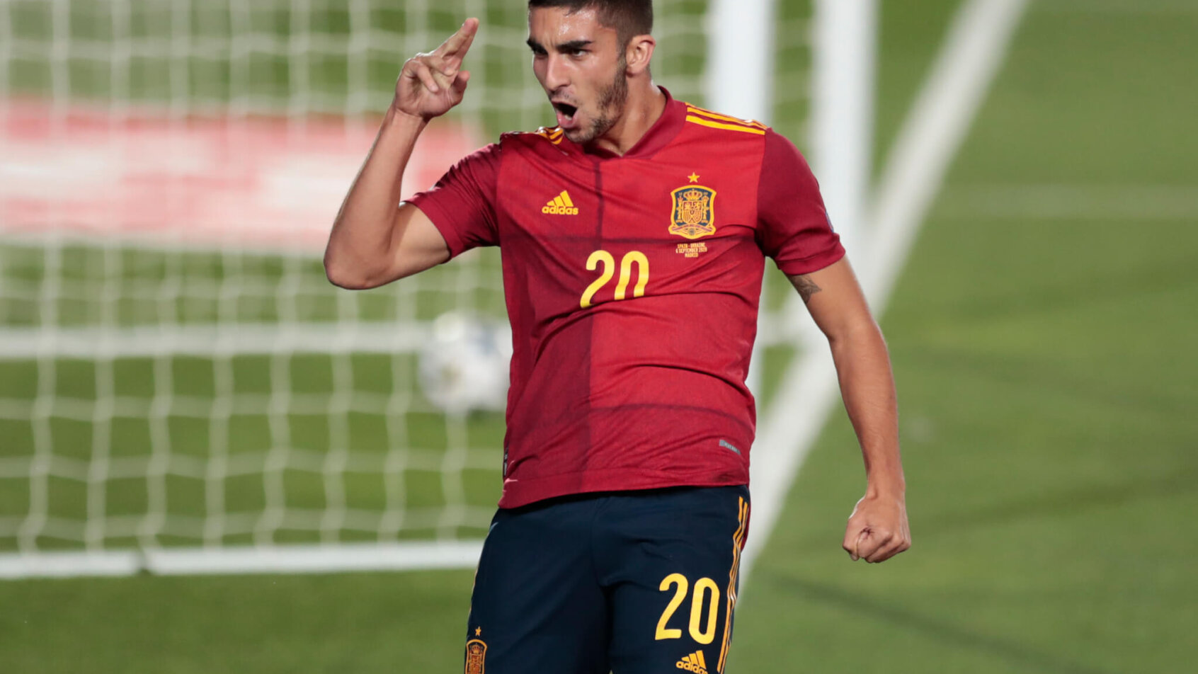 Ferran Torres celebrating after scoring a goal during the UEFA Nations League soccer match.