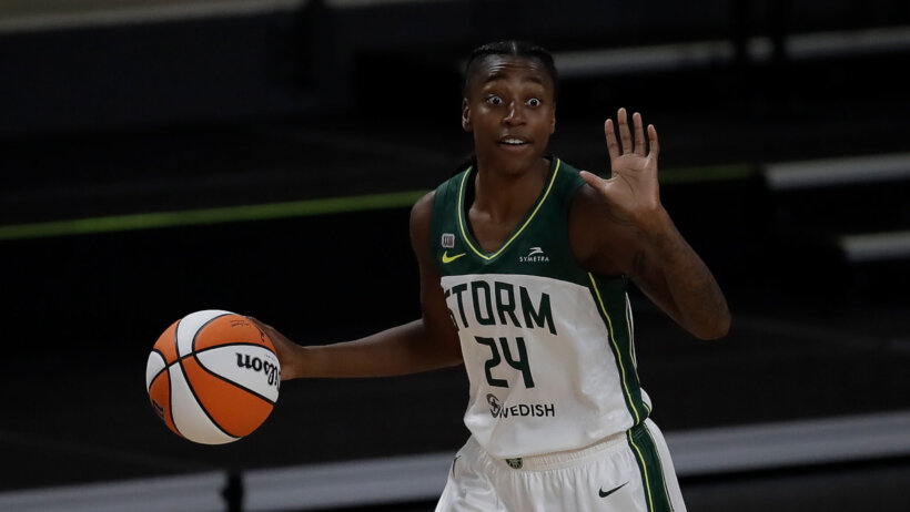 Jewell Loyd dribbling ball with hand up