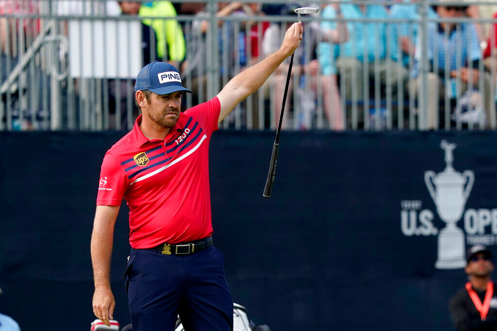 Louis Oosthuizen celebrates a made putt