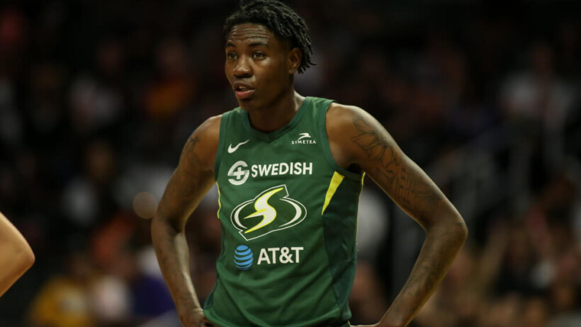 Seattle Storm forward Natasha Howard with her hands on her hips during a WNBA game.