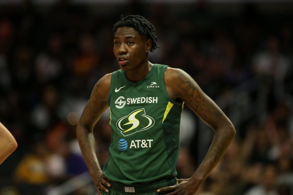 Seattle Storm forward Natasha Howard with her hands on her hips during a WNBA game.