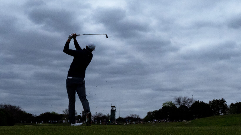 Spieth tees off