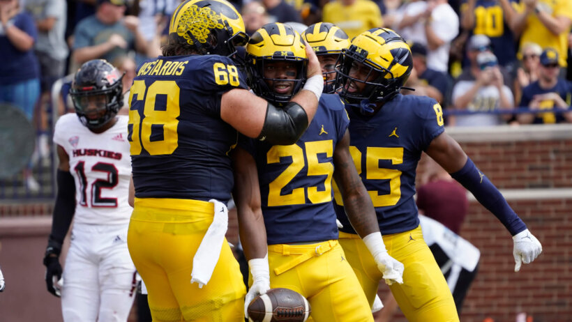 Hassan Haskins celebrates
