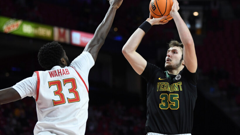 Vermont forward Ryan Davis shooting a jumper