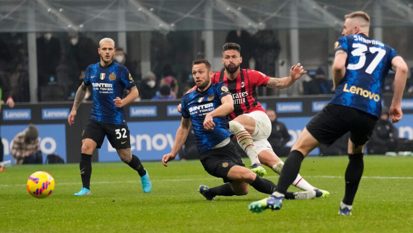 AC Milan's Olivier Giroud, second from right, scores