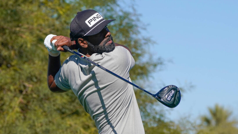 Sahith Theegala watching ball after swing