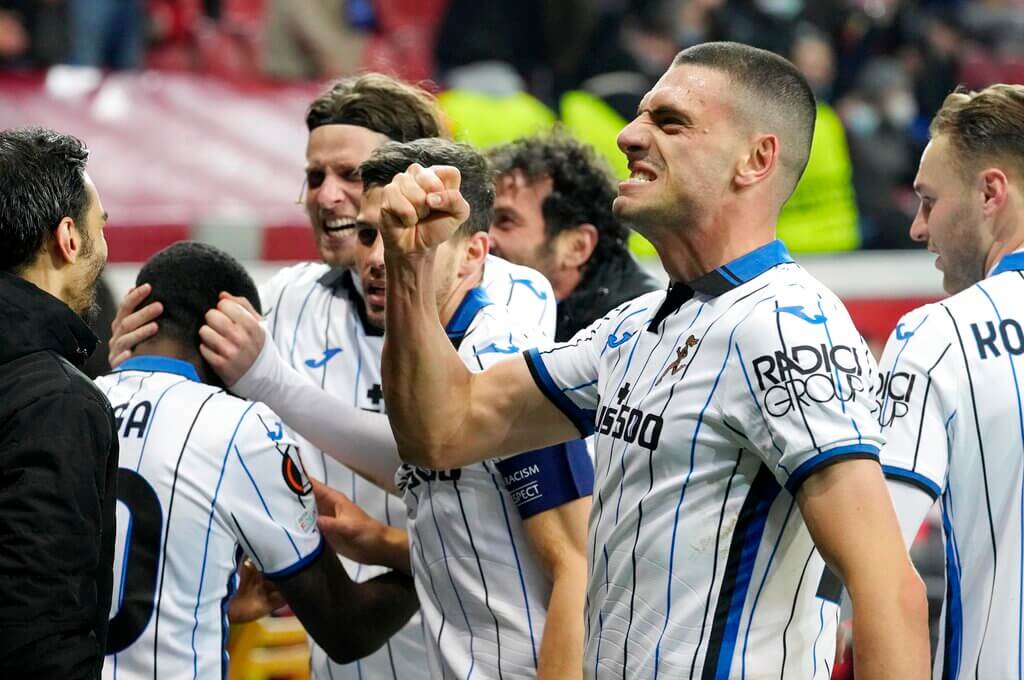 Atalanta's Merih Demiral reacts to fans