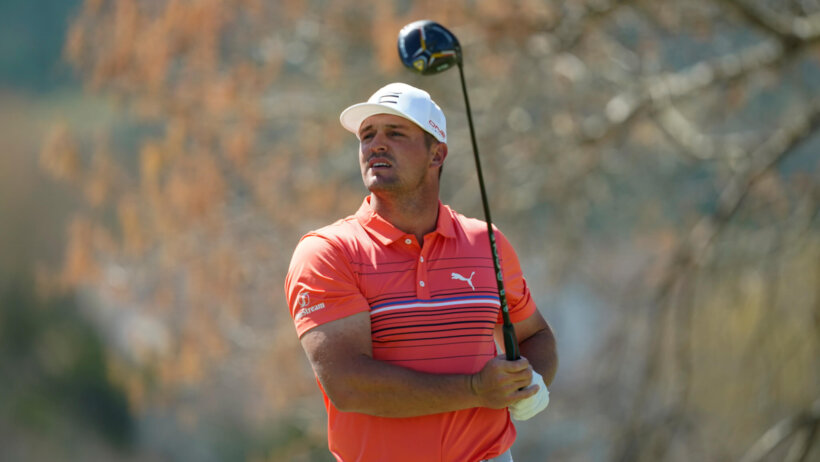 Bryson DeChambeau admires a drive
