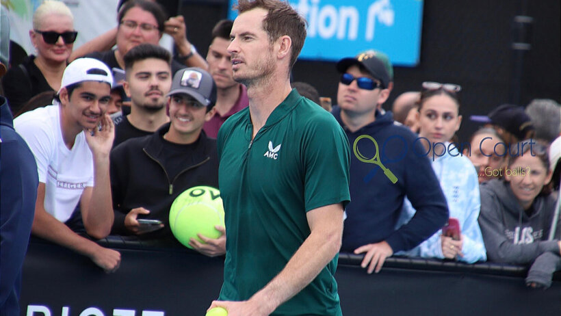 Andy Murray signs some autographs
