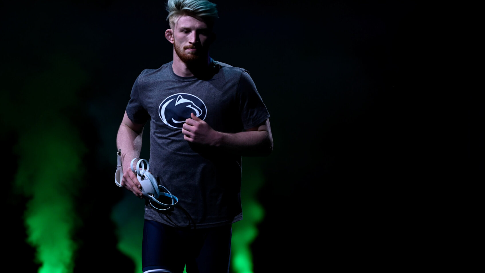 Penn State wrestler Bo Nickal walking to the mat before a match