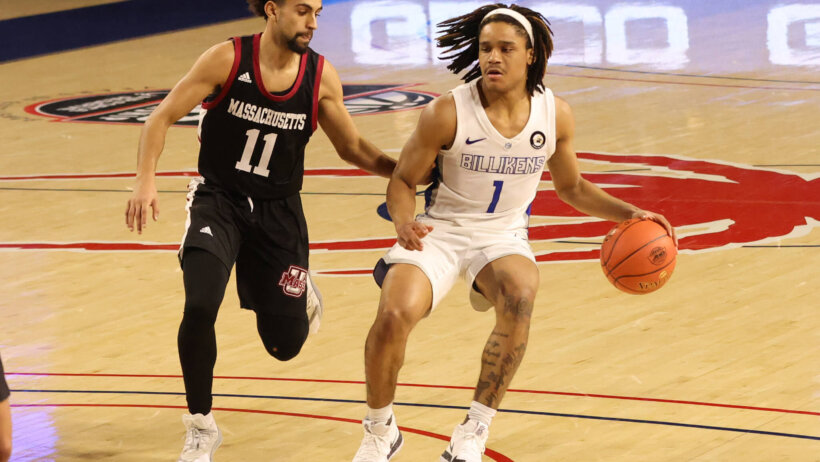 Yuri Collins dribbling past defender