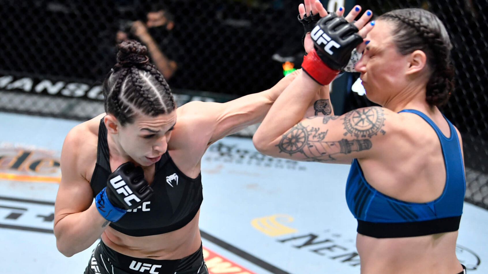 Mackenzie Dern punching Nina Nunes in the face