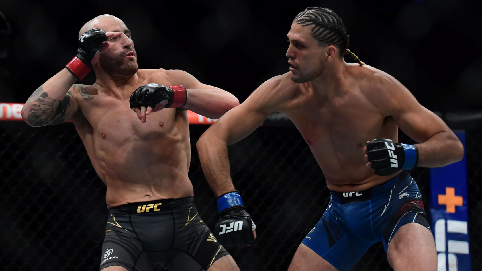 Brian Ortega throwing a punch at Alexander Volkanovski