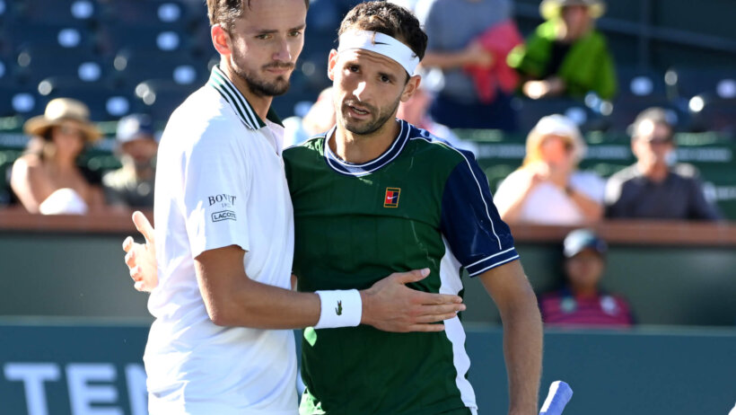 Daniil Medvedev shakes hands with Grigor Dimitrov