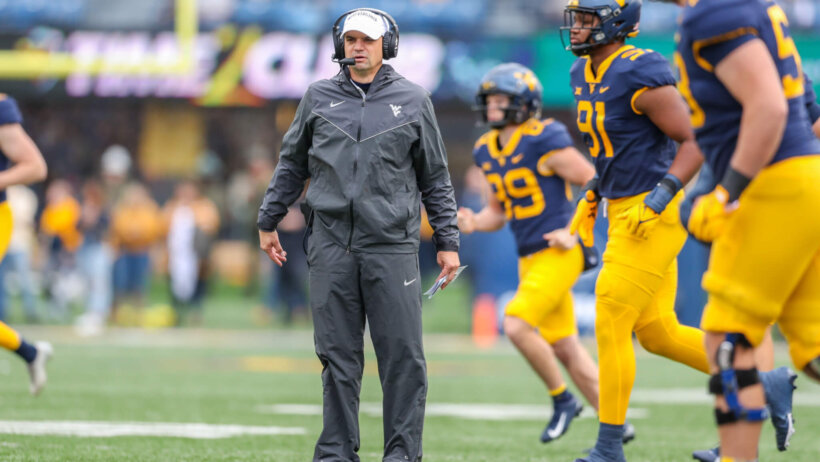 West Virginia Mountaineers head coach Neal Brown along the sidelines