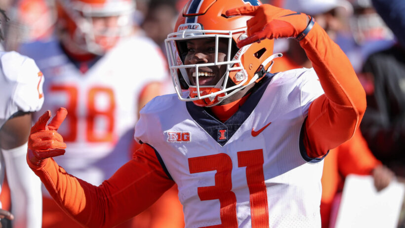 Illinois Fighting Illini defensive back Devon Witherspoon (31) celebrates a win