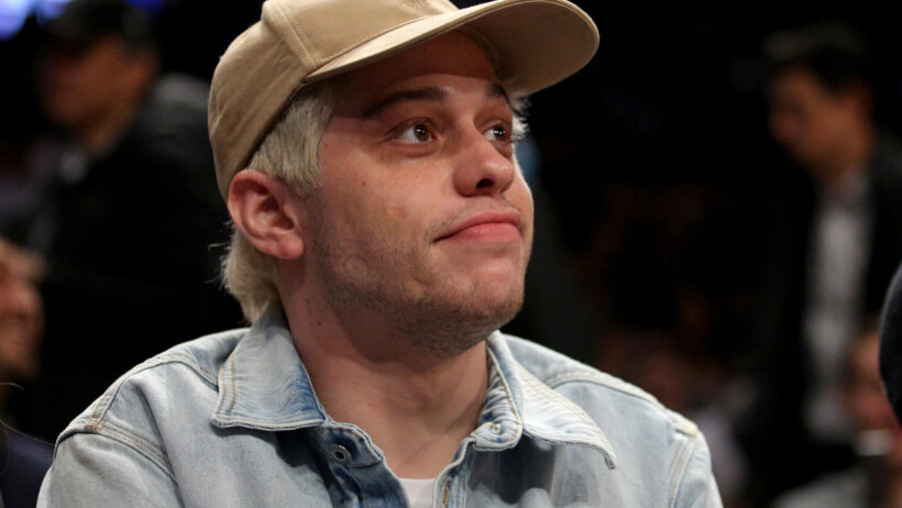 Pete Davidson sitting courtside