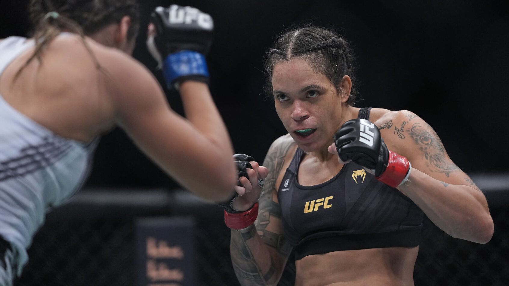 UFC 277 fighters Amanda Nunes and Julianna Pena.