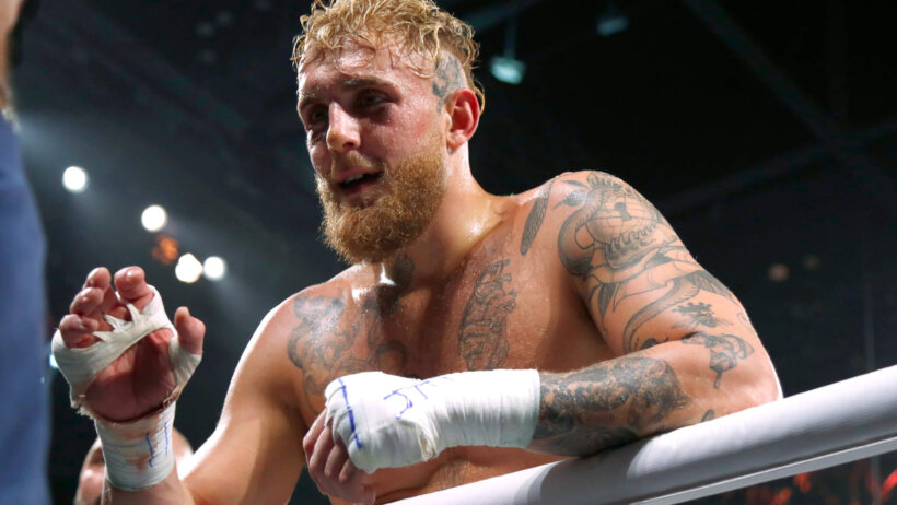 Jake Paul, who is rumored to fight Andrew Tate, celebrates a boxing win